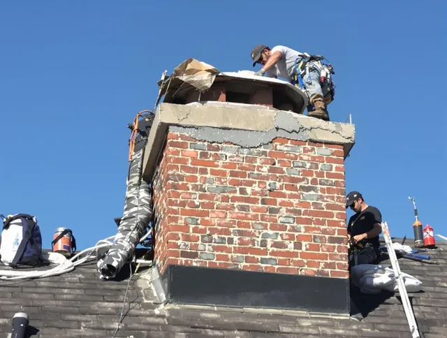 El Monte Chimney Sweep installing a custom chimney crown in El Monte, CA