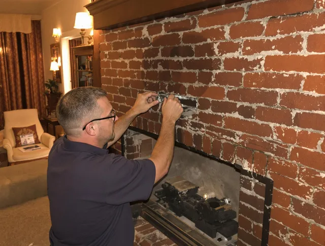 El Monte Chimney Sweep expert fixing a fireplace in El Monte, CA
